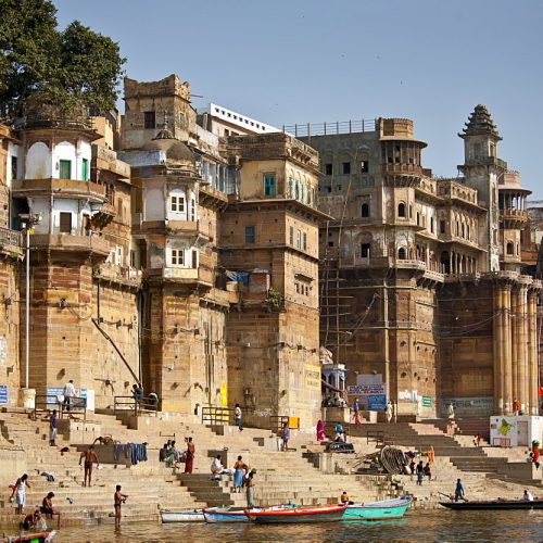 Indian Hindu pilgrims bathing in The Ganges River at Ranamahal Ghat and Chousatti Ghat in Holy City of Varanasi, India